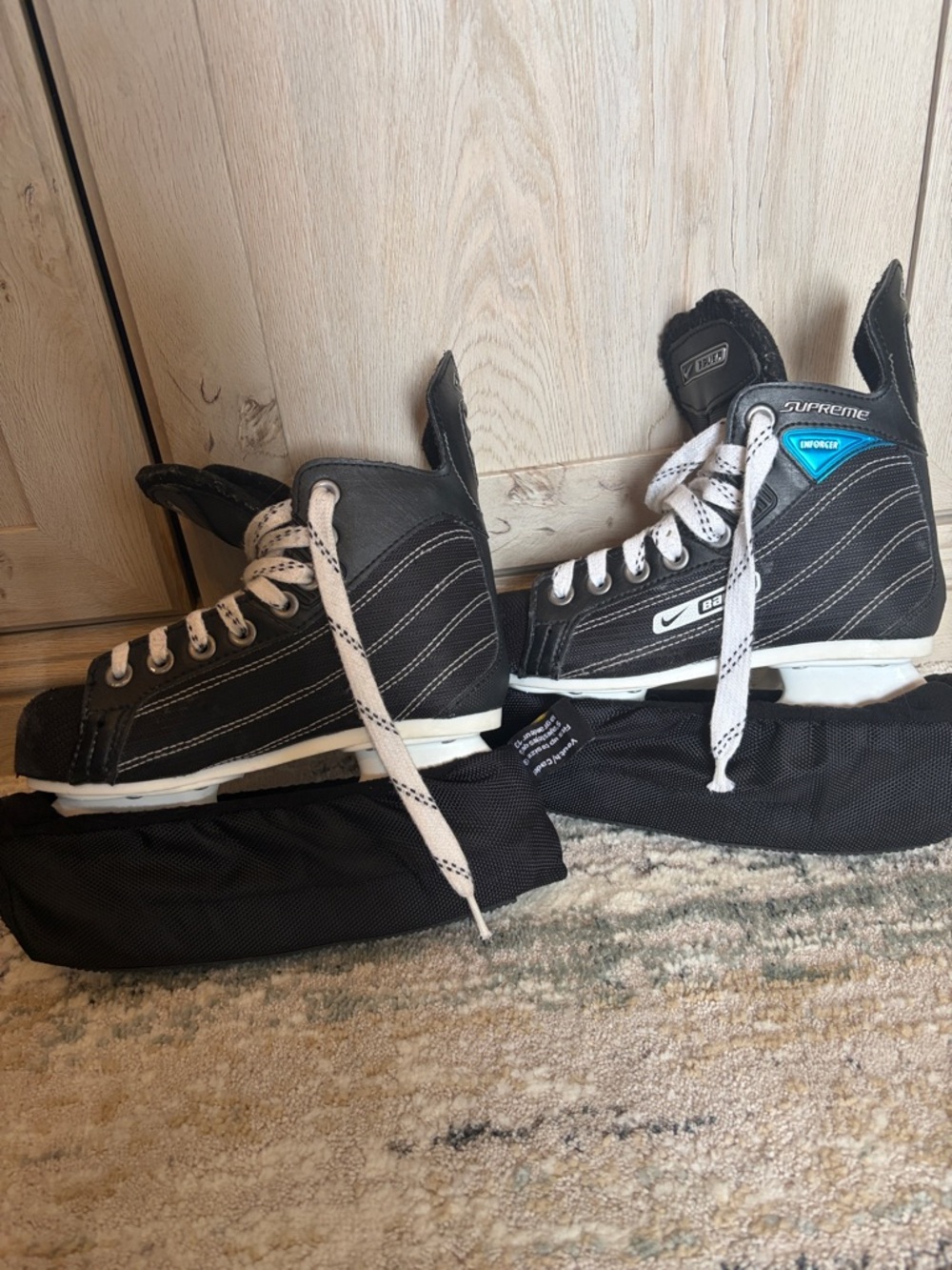 Bauer Kids Black and White Hockey Skates Y13 used condition